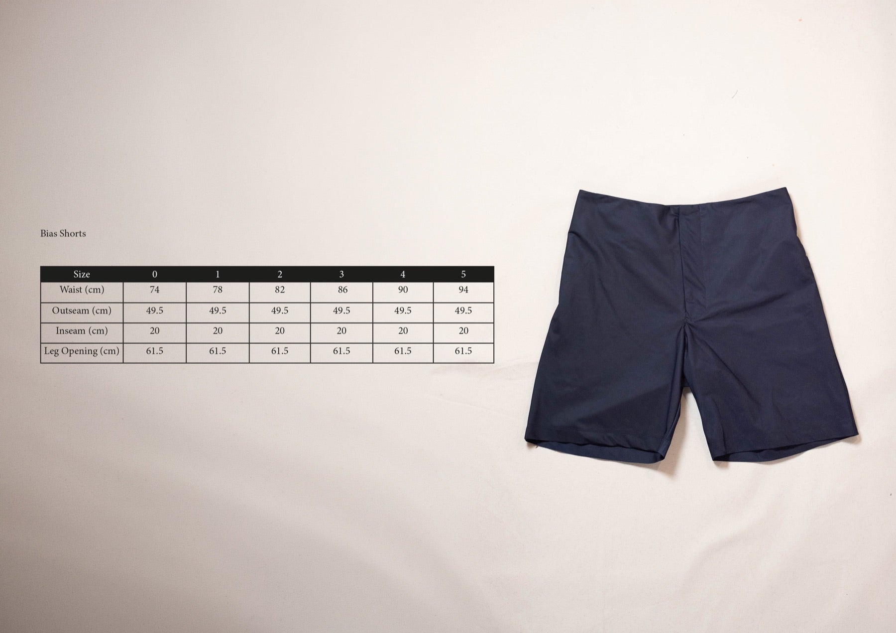 Size chart for Bias Shorts in Navy Silk, measurements in centimetres