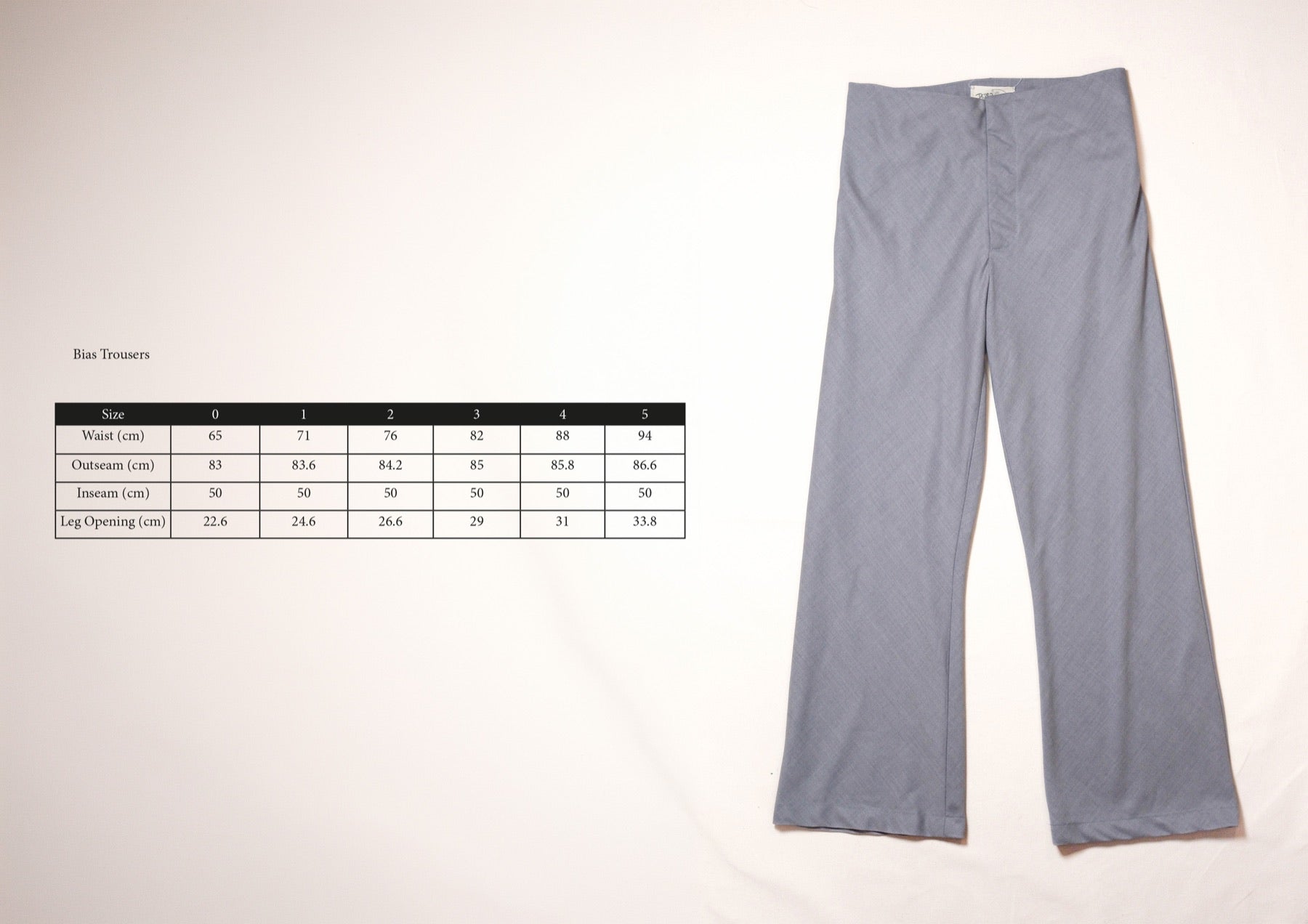 Size chart for Bias Trousers in Grey Wool, measurements in centimetres