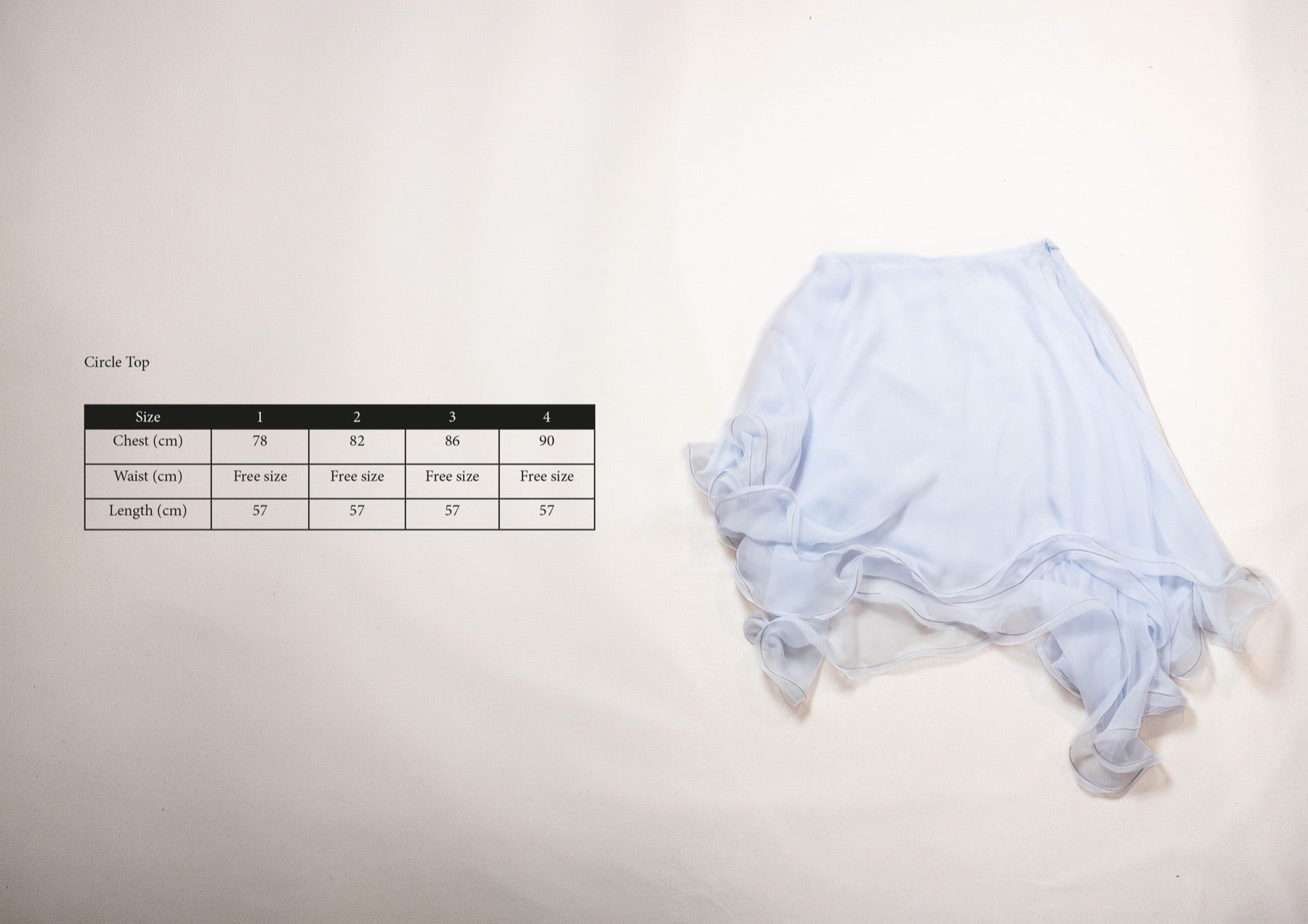 Size chart for Silk Circle Top in Black, measurements in centimetres